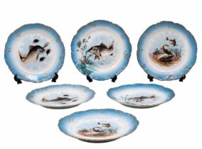 6 porcelain fish plates, late 19th century, decorated with pasted print, handmade enamel colors, and