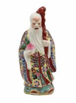 Chinese porcelain statue, a statue in the form of an old sage, made in the Jingdezhen province
