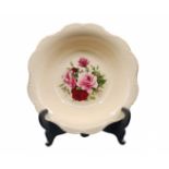 Porcelain bowl, a deep bowl for serving fruit, decorated with a print of blooming roses and a gold