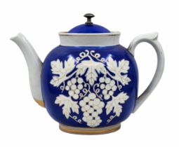 A large Russian (Soviet) teapot, made of decorated porcelain and matching lid, signed. Height: 28