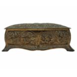 European metal box, a box decorated with a double-headed eagle relief and vines. Signs of rust,