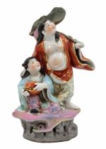 Chinese porcelain statue, a statue in the form of a boy and a girl, made in the Jingdezhen province,