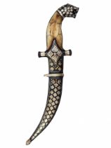 Decorative dagger, made of metal and bone. Length: 26 cm. Width: 9 cm. Period: 20th century