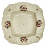 German porcelain bowl, made by 'Rosenthal', decorated with a floral print on a cream background,