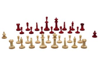 Chess box, the figures are hand-carved, halves painted in red (no board), placed in a wooden box (