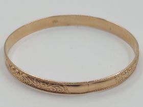 Antique gold bracelet, made of 14 carat gold. The width of the decorated band is 0.50 cm. Inner