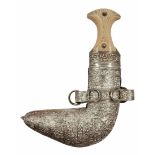 Decorative Yemenite Jambia dagger, is made of silver-plated metal and butt is made of cast white