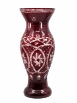 Crystal vase, a large vase, made of layered crystal in a burgundy transparent shade decorated with a