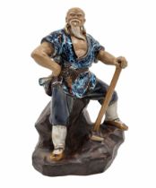 Chinese ceramic sculpture, the Shiwan ware sculpture in the form of a woodcutter, made of clay