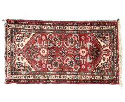 Persian carpet, the Madan carpet, defects. Dimensions: 119X64 cm. Period: 20th century