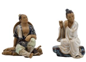 A pair of figurines, chinese ceramic sculptures made by Shiwan (Shiwan ware), made of clay,