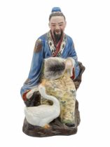 Chinese porcelain statue, a statue in the form of a man and a goose, made in the Jingdezhen province