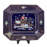 Japanese porcelain tray, an octagonal tray, decorated with the image of a peacock on a cobalt blue