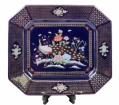 Japanese porcelain tray, an octagonal tray, decorated with the image of a peacock on a cobalt blue