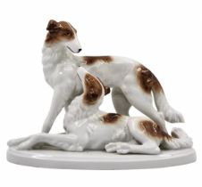 Quality porcelain figurine, in the form of a pair of dogs, hand painted, not signed. Height: 16.5