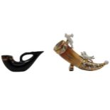 2 porcelain ornaments, in the shape of a cornucopia and a pipe, decorated with prints and gold,