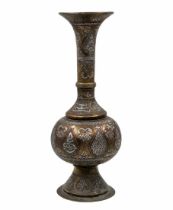 Antique Islamic vase, a vase made of brass decorated in 'Damascus work' (silver and copper inlay