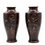 A pair of antique Japanese bronze jugs from the 'Meiji Period', end of the 19th century, unsigned,