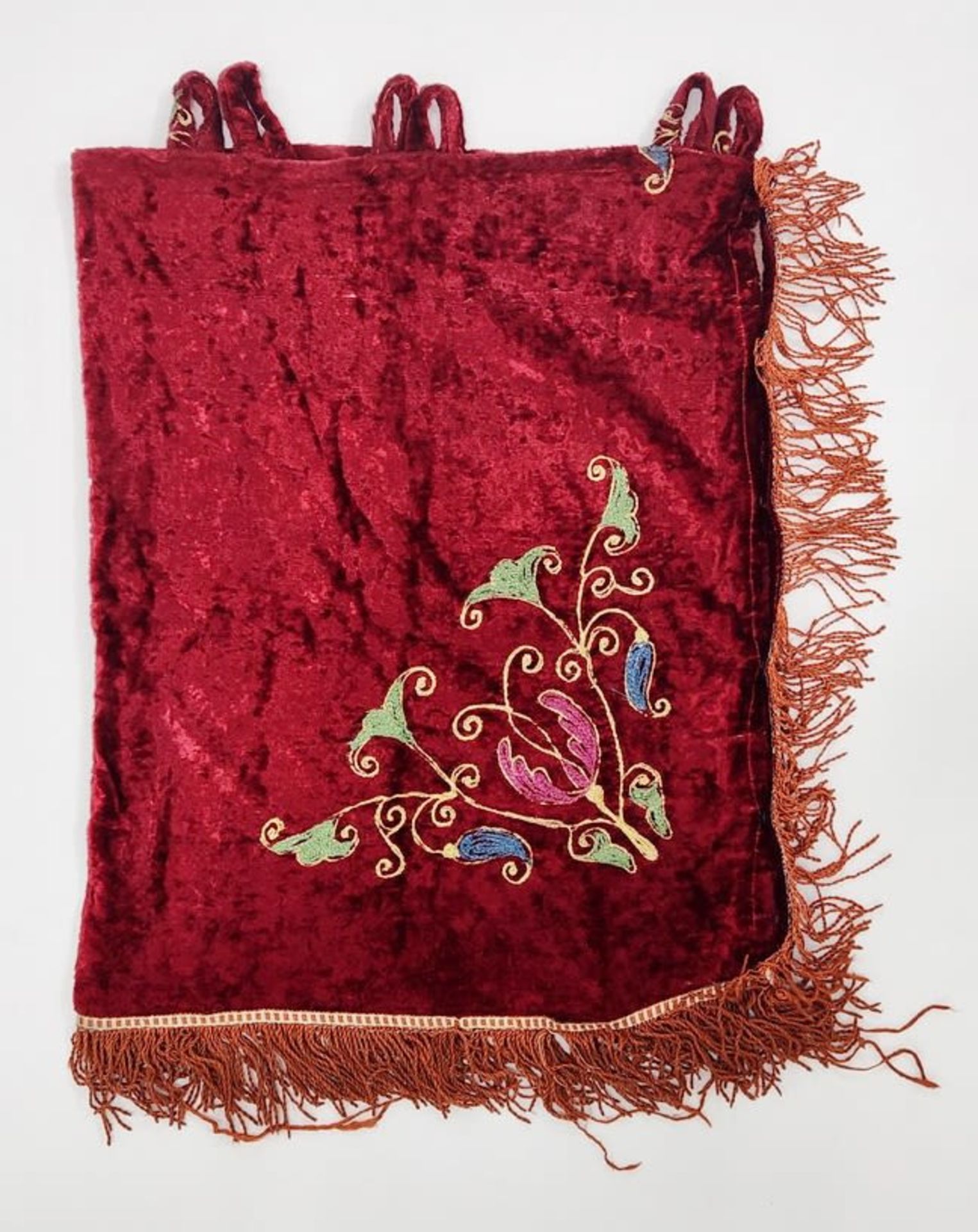 A Torah scroll coat, decorated with cotton thread weaving on red velvet and red fabric strands,