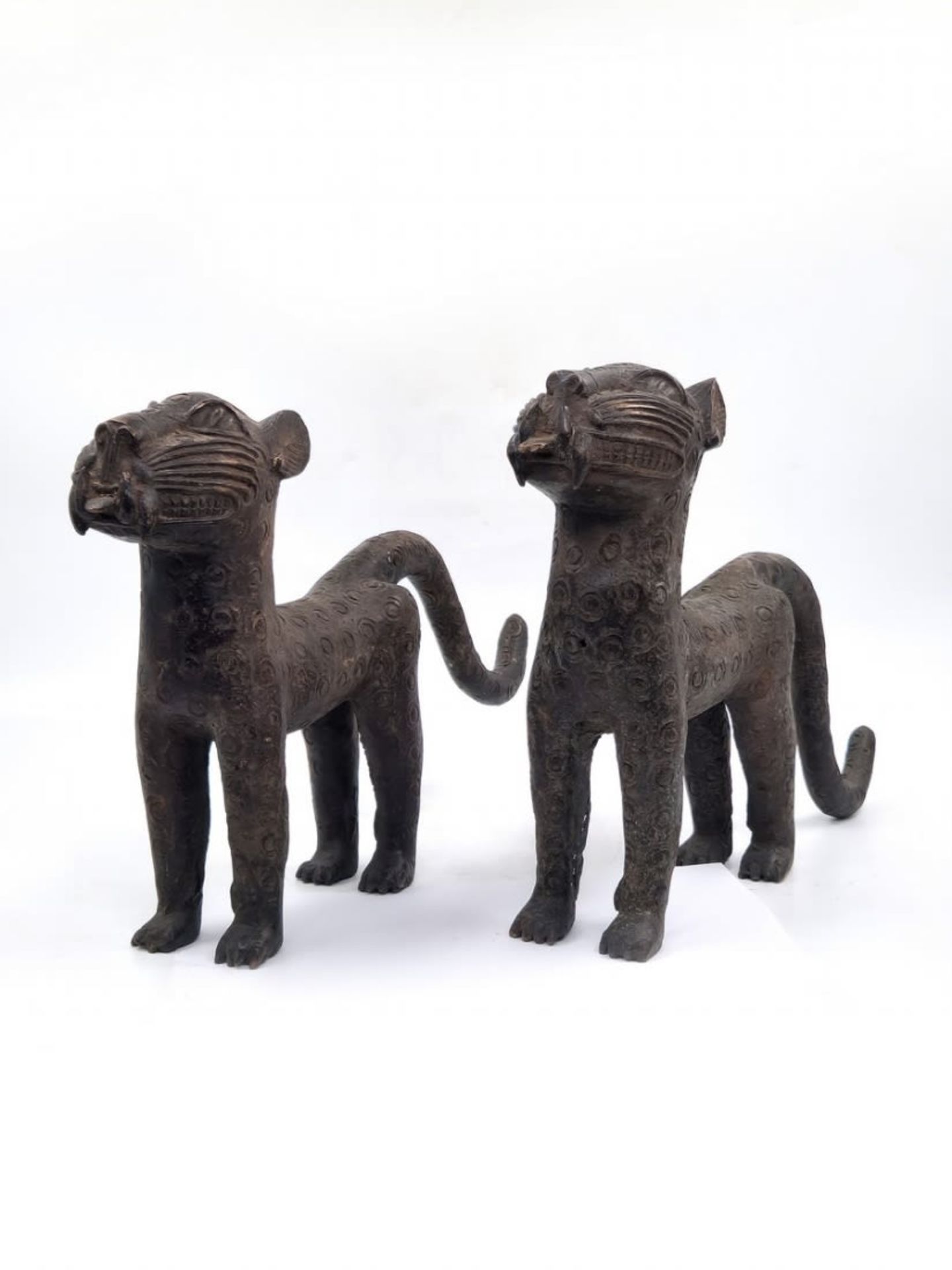 A pair of antique African statues, around hundred years old, in the form of panthers, made in '