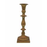 An antique Jewish candlestick from the 18th century, made of bronze (two parts), converted in the