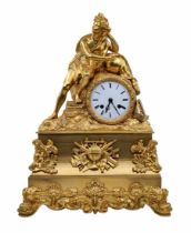 An antique French mantle clock, made of gilded bronze (Ormolu - or dore bronze). decorated with