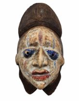 Antique tribal African mask, Punu people of Gabon, from the first third of the 20th century, made of