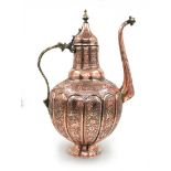 An antique Persian vessel, from the Qajar Dynasty period, made of copper and brass and decorated