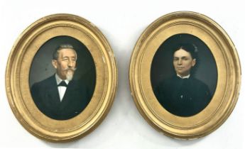A pair of old English (Victorian) paintings, portraits of a man and a woman, oil on board, framed in