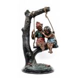 'Children on a swing' - a decorative bronze statue, colored patina, stepped black marble base,