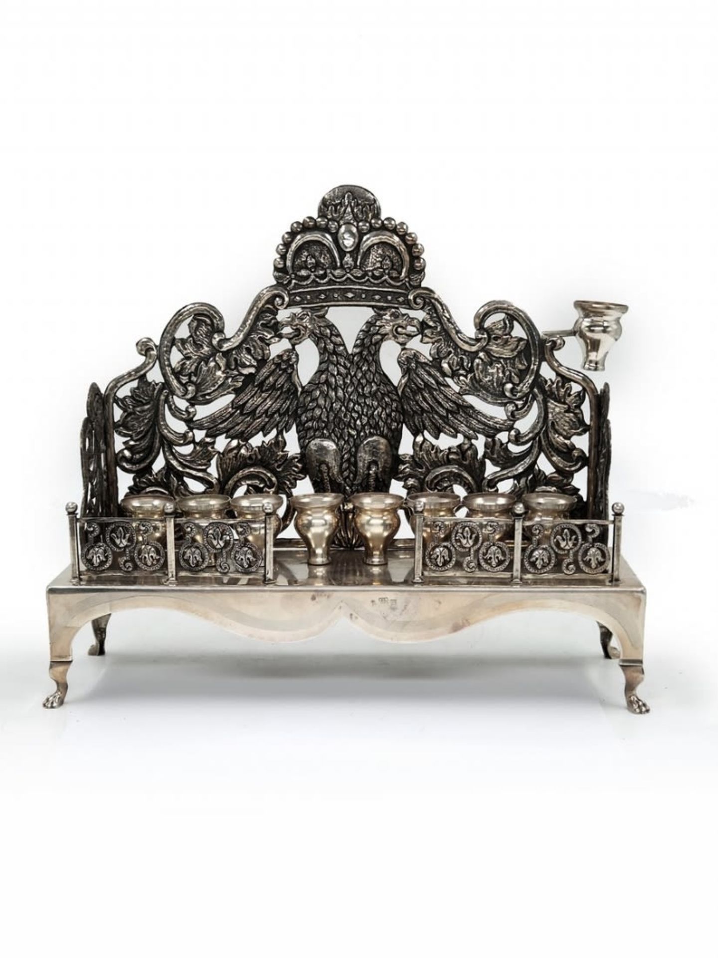 Impressive and beautiful Menorah made of sterling silver, (signed), decorated with an eagle pattern,