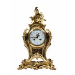 Antique French mantle clock, made of gold-plated bronze (Ormolu), the mechanism is signed by the