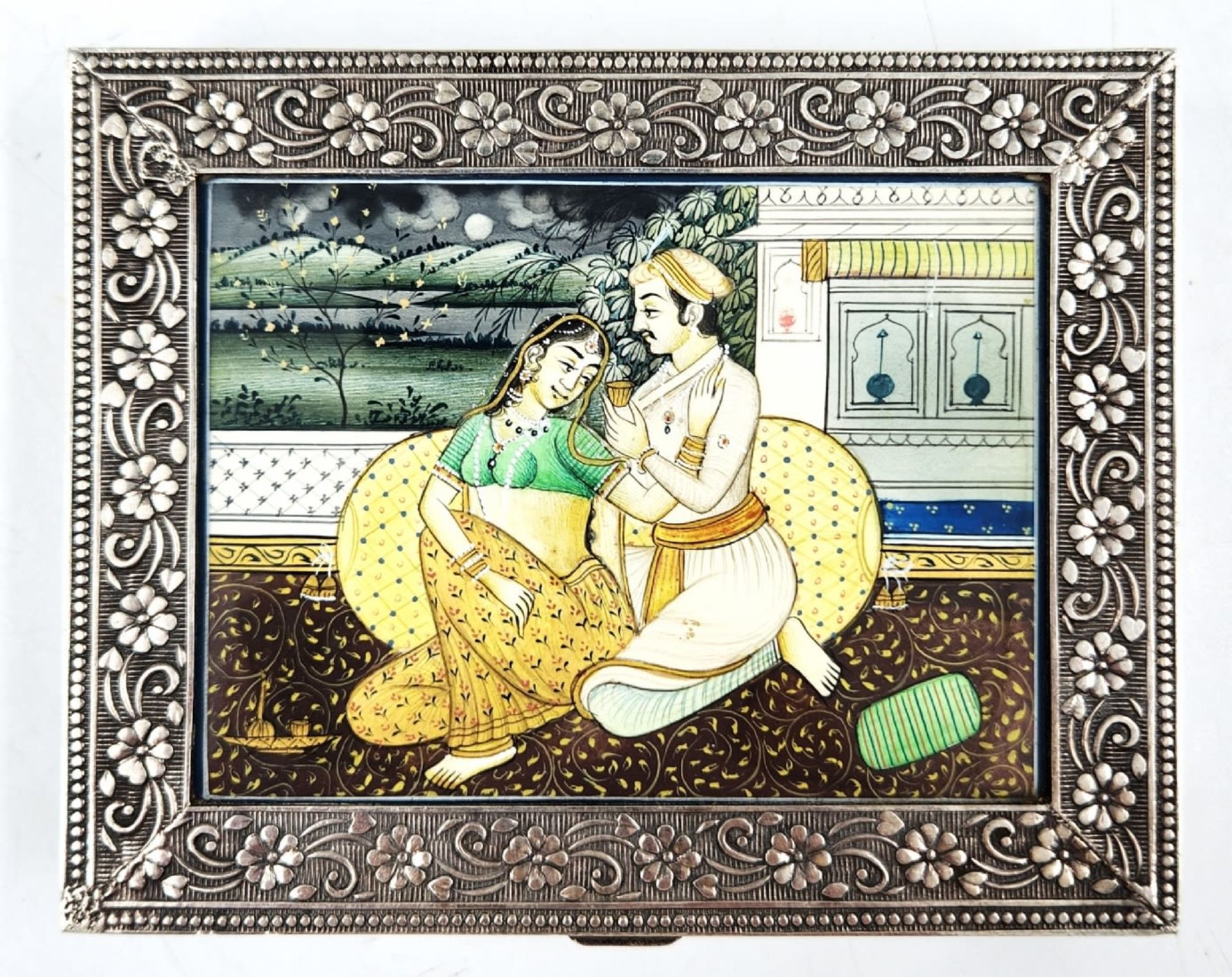 An Indian silver box decorated with a high-quality miniature painting, not signed, the purity of the