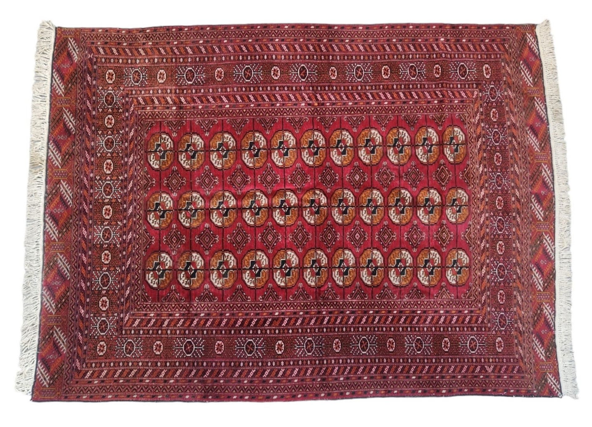 Bukhara carpet, examples of elephant feet, wool on cotton, handmade, Dimensions: 190x140 cm. Period: