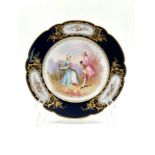 An antique French porcelain plate made by 'Sevres', made in 1864 and decorated in 1878 with hand