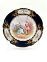 An antique French porcelain plate made by 'Sevres', made in 1864 and decorated in 1878 with hand