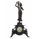 Antique French mantle clock, 19th century, made of mottled Egyptian granite marble and Spelter,