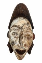 Mask of a young girl - Central Africa, a mask of Punu tribe from central Africa, Gabon or the