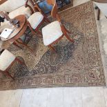 A large, high-quality and particularly beautiful Persian carpet, slightly worn, in the living