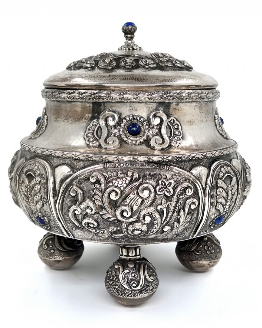 A large high-quality and impressive silverware, hand made from silver in repousse technique., made