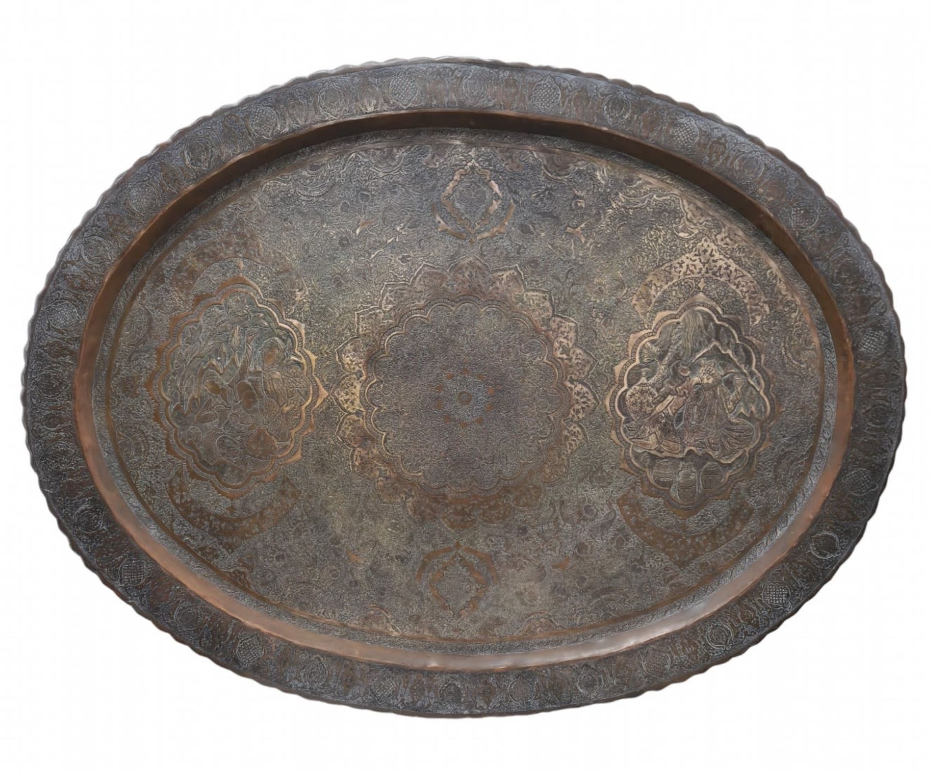 An antique and large Islamic tray made of copper, decorated with manual embroidery work in a dense