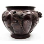 An antique Japanese bronze pot from the 'Meiji Period', decorated with a pattern of birds on