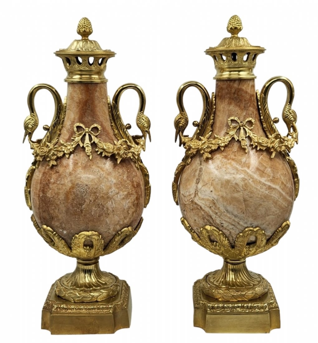 A pair of heavy and impressive French vases in the Louis XVI style, made of natural marble and