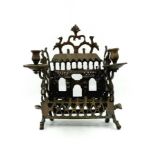 An antique menorah, 18th century, Eastern Europe (apparently Poland), made of bronze, the back is