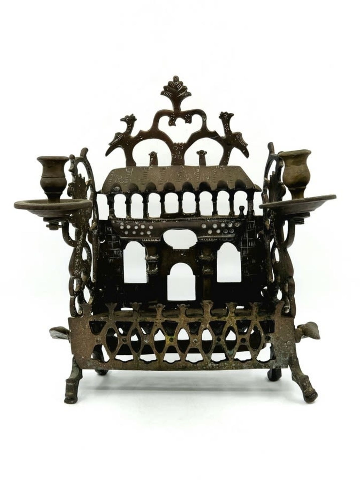 An antique menorah, 18th century, Eastern Europe (apparently Poland), made of bronze, the back is
