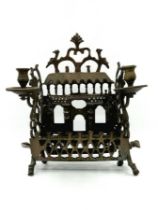 An antique menorah, 18th century, Eastern Europe (apparently Poland), made of bronze, the back is