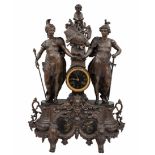 Large antique French mantel clock, magnificent and impressive, made of spelter painted with a cold