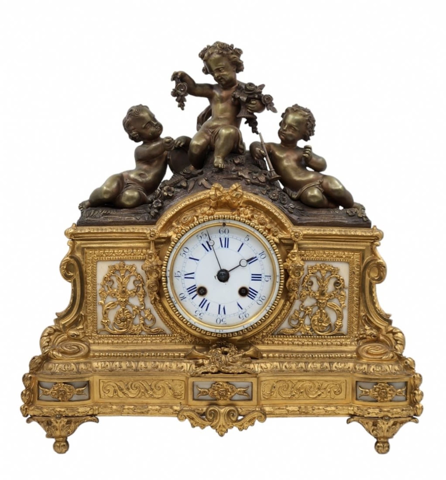 Antique French mantle clock, from the 19th century, made of bronze and white marble, the head is