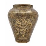 An antique Persian urn, an urn from the 19th century, made of brass and decorated with delicate
