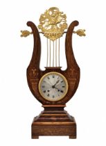 Antique mantle clock from the mid-19th century, designed in the shape of a lyre, made in 'Empire'